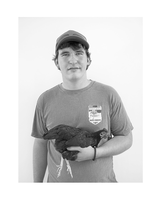 Matt Rahner, "Fair Man, #1, with Chicken," 2017, photograph.