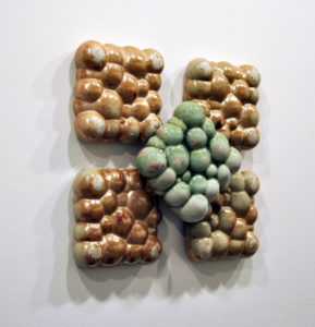 Jarred Pfeiffer, “Bubble Clouds,” 2022; slip-case and wood-fired porcelain; 18 x 18 x 6 in. Courtesy of the artist.