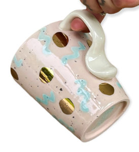 Didem Mert, “Bling Polka Dotted Squiggle Mug,” 2022; porcelain with underglazes, washes, glazes, and lustre; 3 ½ x 4 ½ x 3 ½ in. Courtesy of the artist.