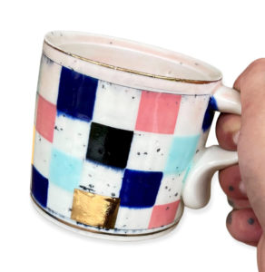 Didem Mert, “Bling Checkered Mug,” 2022; porcelain with underglazes, washes, and glazes; 3 ½ x 4 ½ x 3 ½ in. Courtesy of the artist.