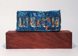 Adam Welch, “Fetish: Mother of Pearl,” 2018; brick, glaze, mother of pearl, and wood; 7 x 12 x 3 in. Courtesy of the artist.