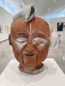 Stan Welsh, "Listen," 2003; terra cotta and glaze. Gift of Dr. Harold F. Daum.